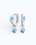Pearlystones sterling silver hoop earrings with dangling turquoise  coloured stones and cubic zirconia accents.