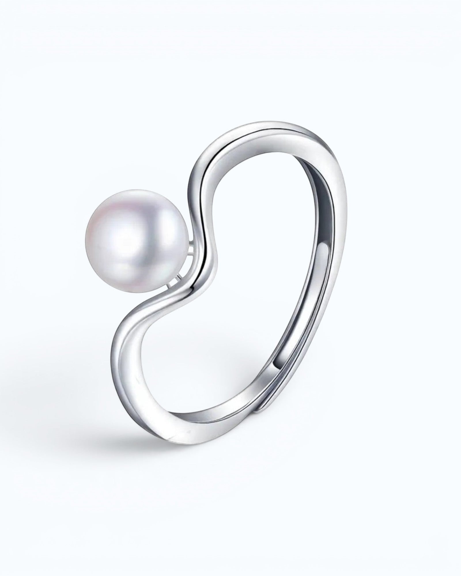 Pearlystones minimalist V-shaped adjustable ring featuring a lustrous white freshwater pearl in a silver-tone finish.