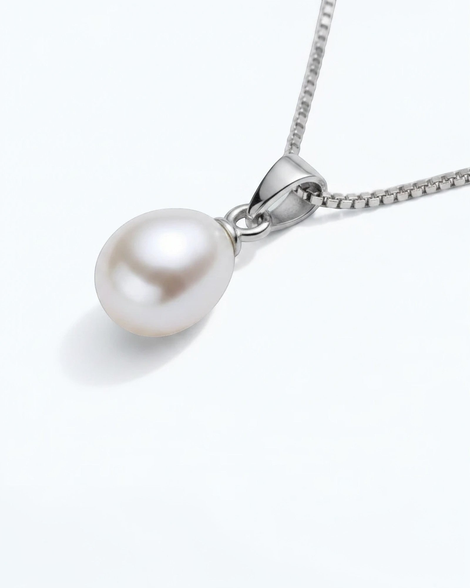 Pearlystones white teardrop pearl pendant on a delicate rhodium plated silver chain