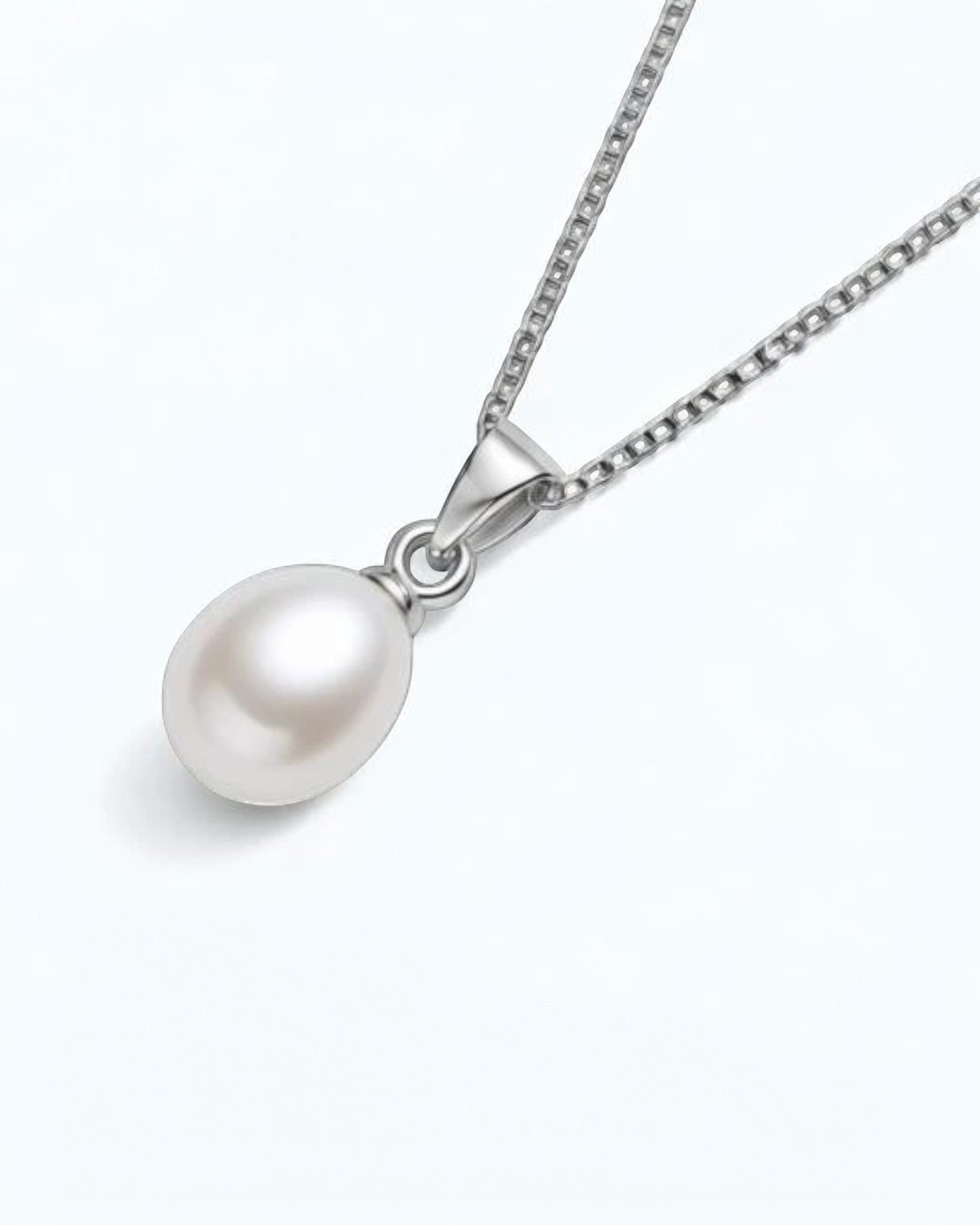 Pearlystones elegant white teardrop pearl pendant on a delicate rhodium plated silver chain