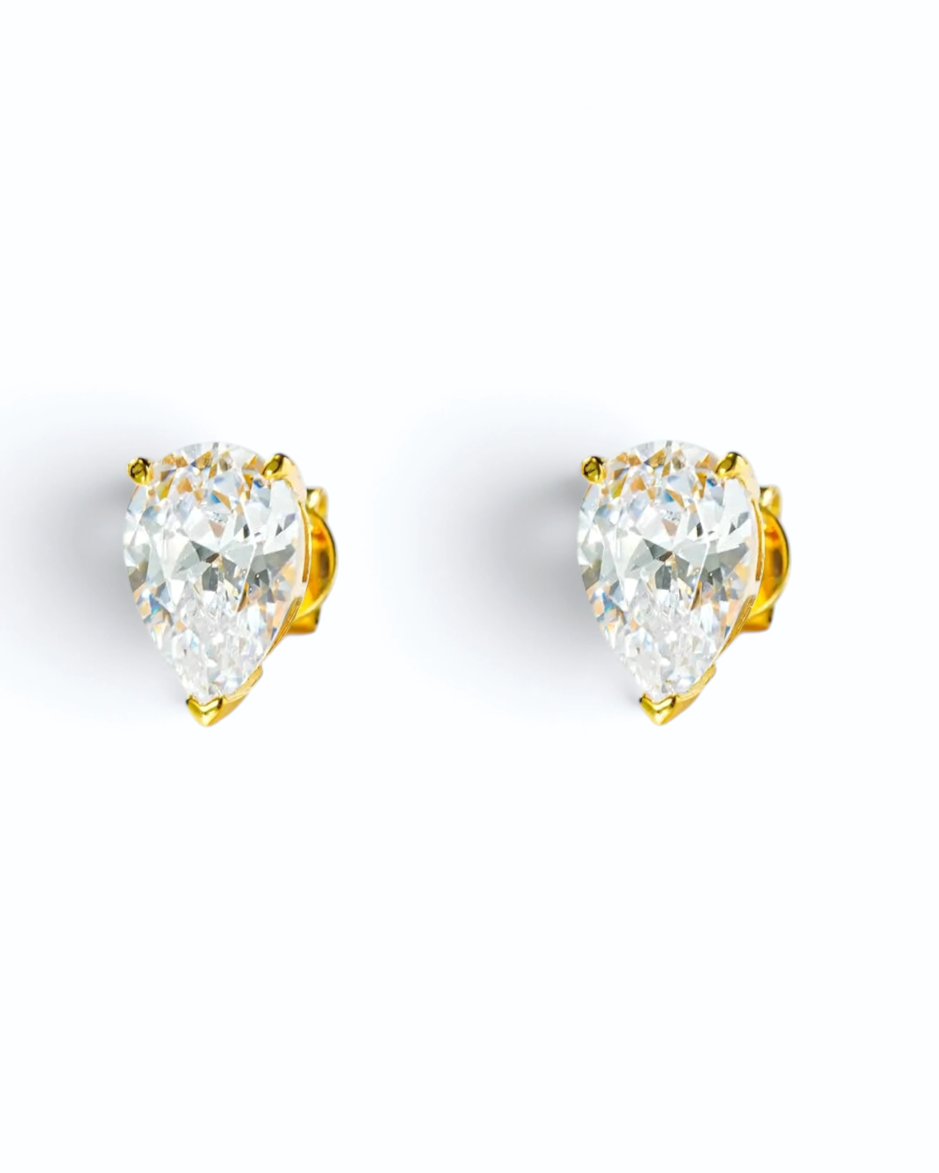 Pearlystones white water droplet stud earrings featuring brilliant pear-cut cubic zirconia in gold settings.