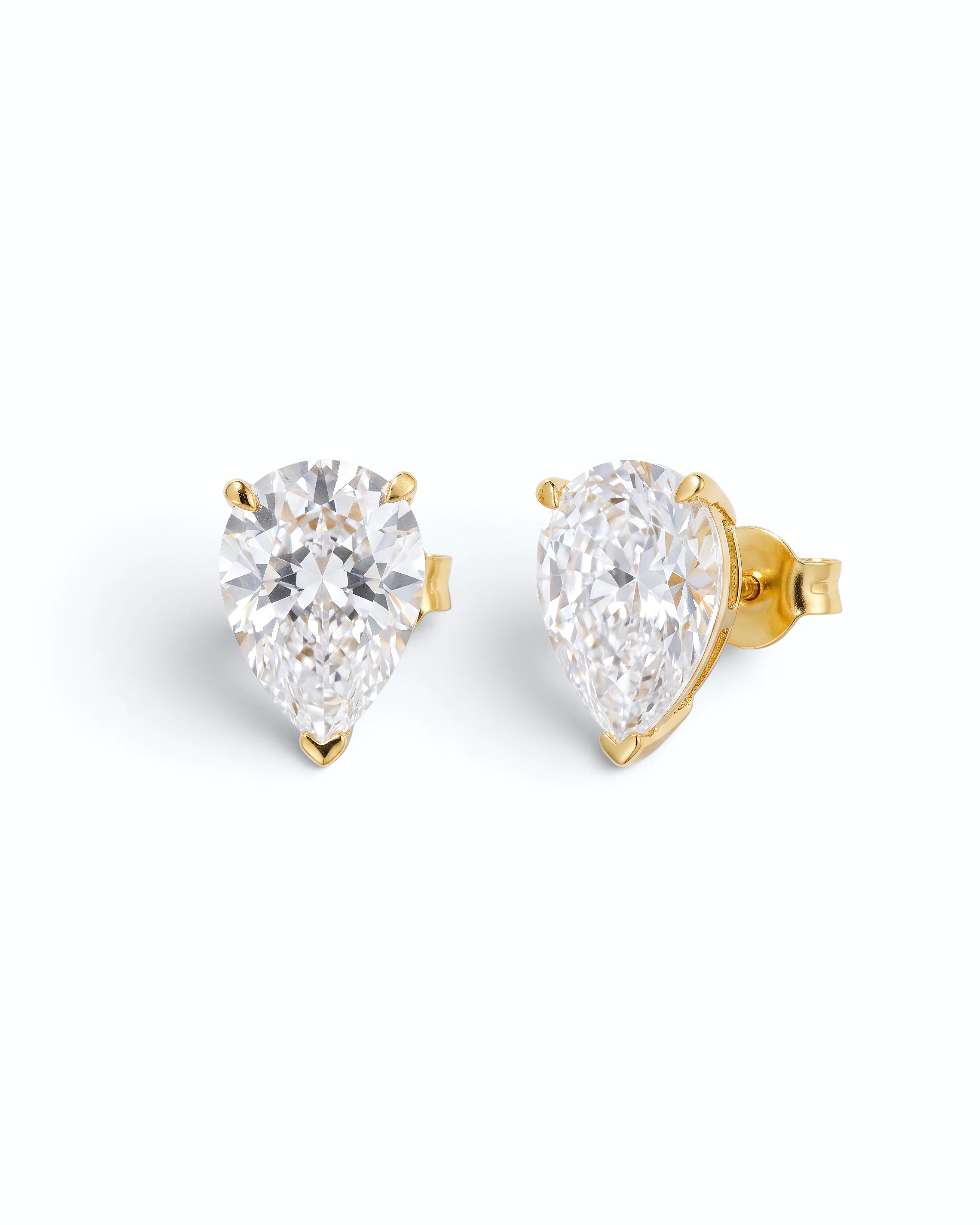 Pearlystones white cubic zirconia water droplet stud earrings in gold setting on a clean white background