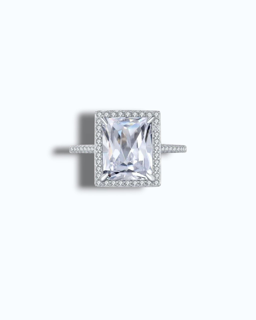 Pearlystones sterling silver cocktail ring with a large rectangular white zirconia center stone surrounded by a halo of smaller stones.