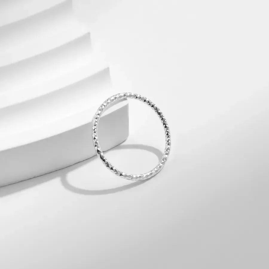 Silver Wave Textured Ring with metallic shine, featuring a sleek and simple irregular wave design, ideal for daily wear.