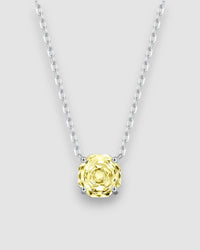 Yellow zircon pendant necklace featuring an octagonal rose cut stone set in sterling silver chain.