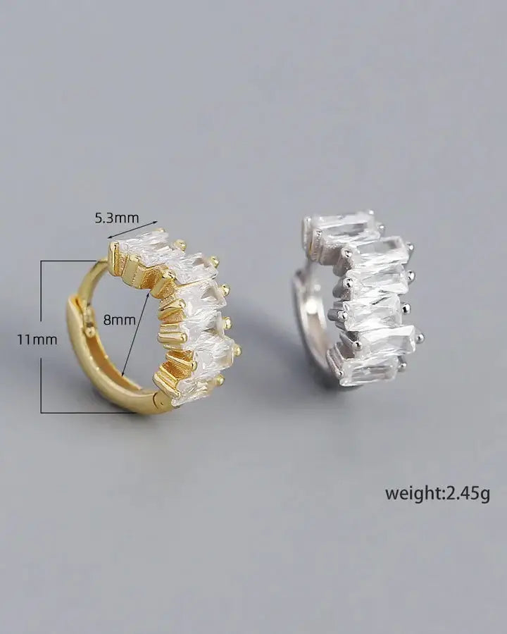 Sparkly 8mm sterling silver sleeper hoops with white gold plating and 18k gold option, showcasing elegant design and light sparkle.