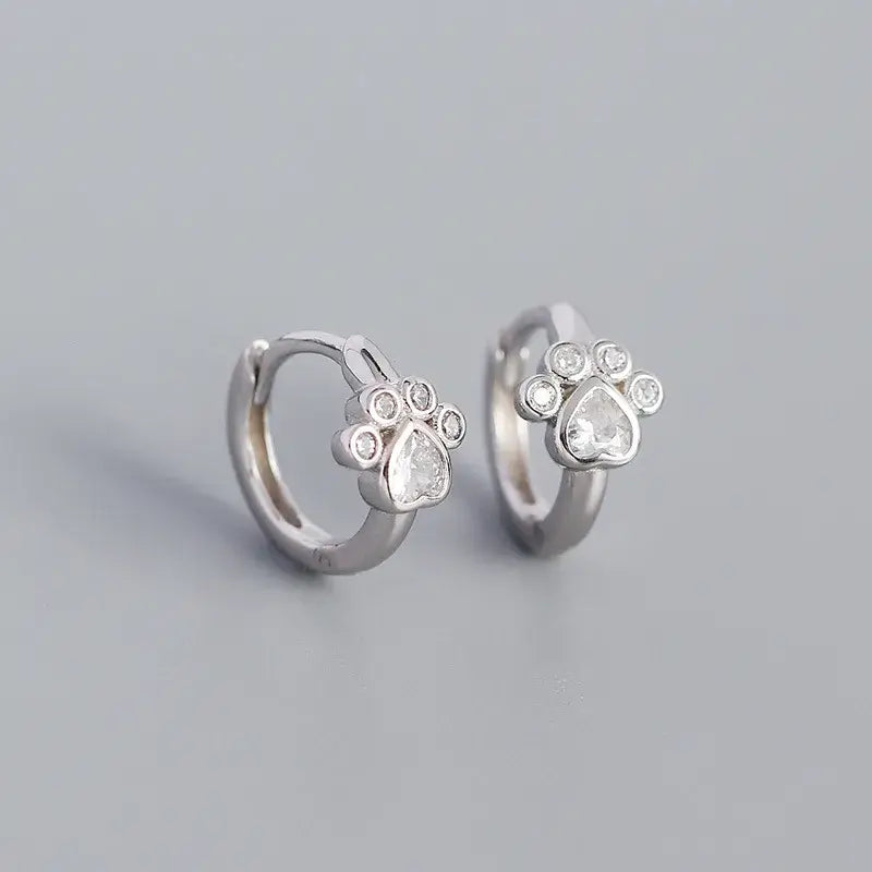 Delicate sterling silver cat footprint hoops earrings featuring paw design, perfect for everyday elegance.