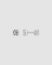 5mm Round brilliant cut moissanite studs displayed on a light gray background.