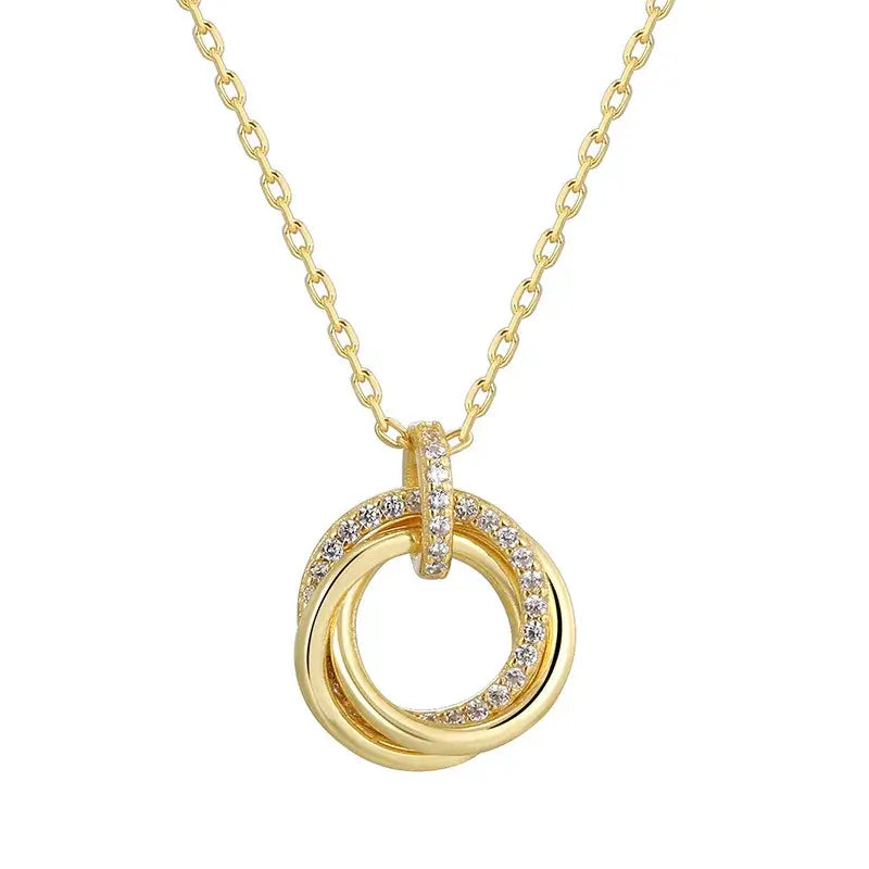Elegant Three-Loop Pendant Necklace in gold plating with sparkling accents, ideal for versatile styling.