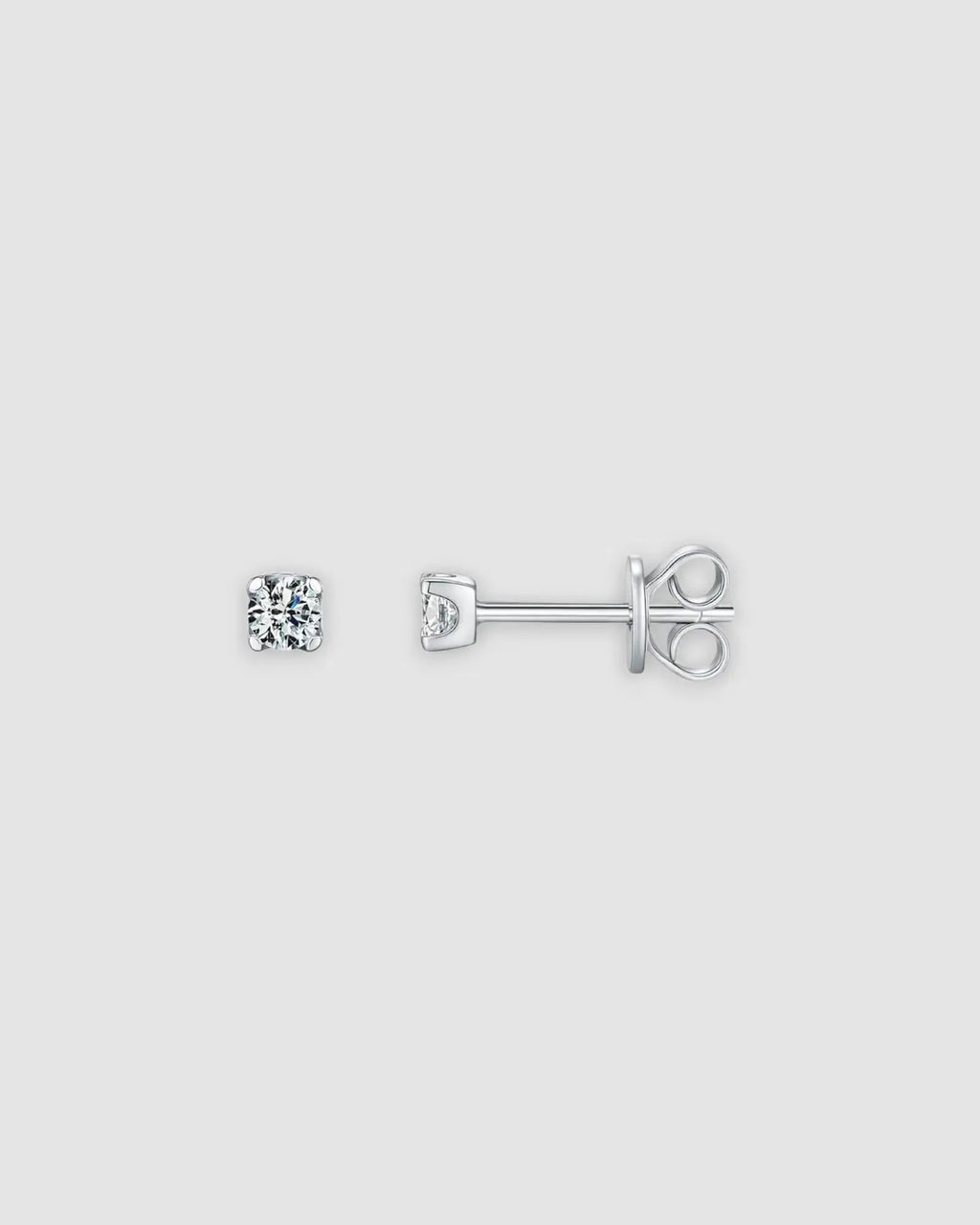 3mm Round brilliant cut moissanite studs in sterling silver with rhodium finish, showcasing a classic prong setting.