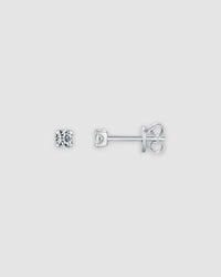 3mm Round brilliant cut moissanite studs in sterling silver with rhodium finish, showcasing a classic prong setting.