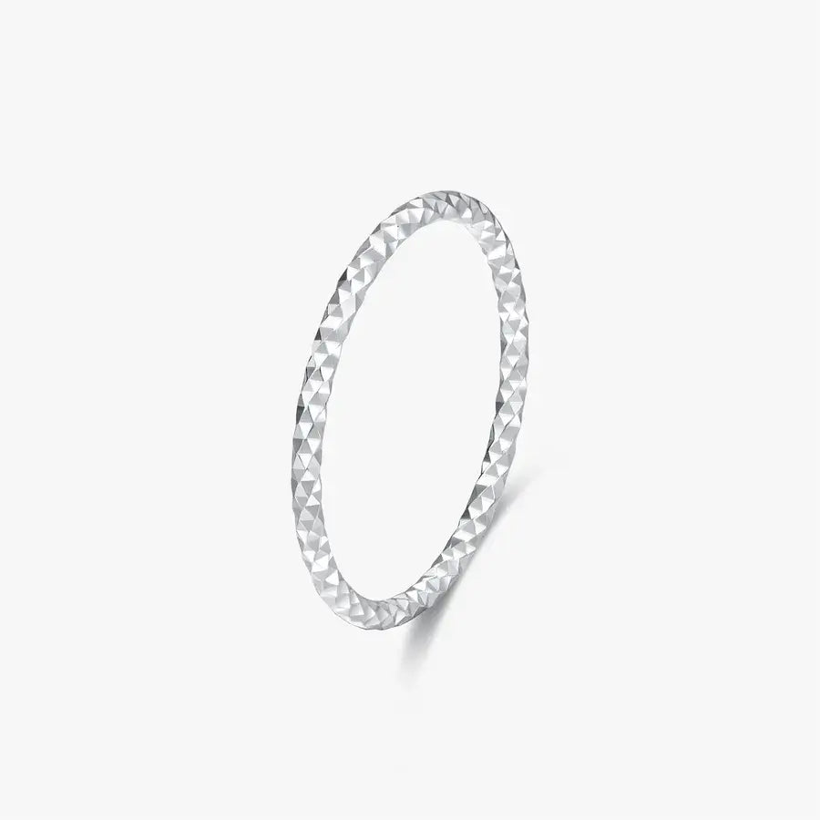 Silver wave textured ring with a metallic shine, perfect for daily wear with a 1mm band width.