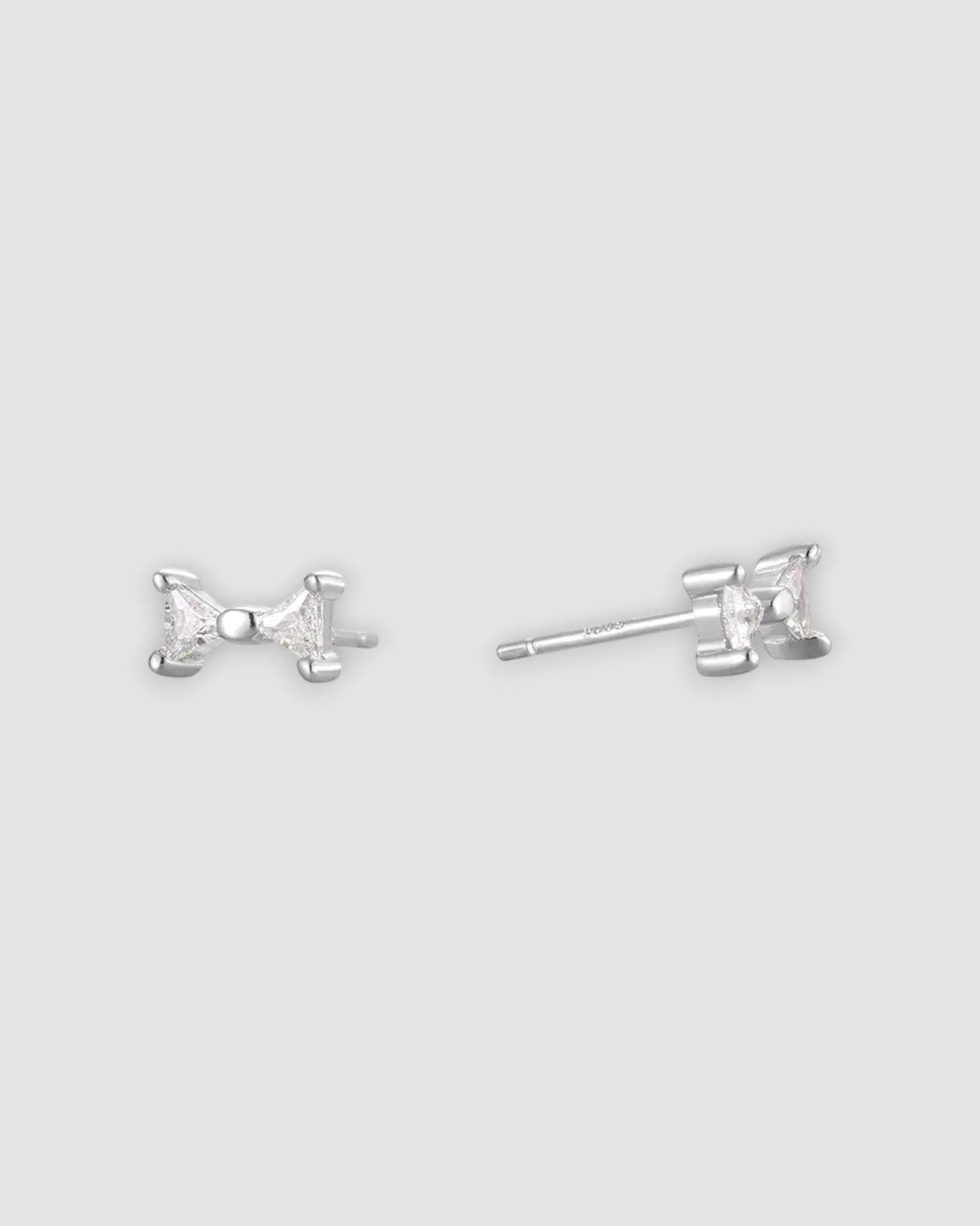 Small Bow Earrings in Sterling Silver studs, lightweight and elegant for everyday wear.