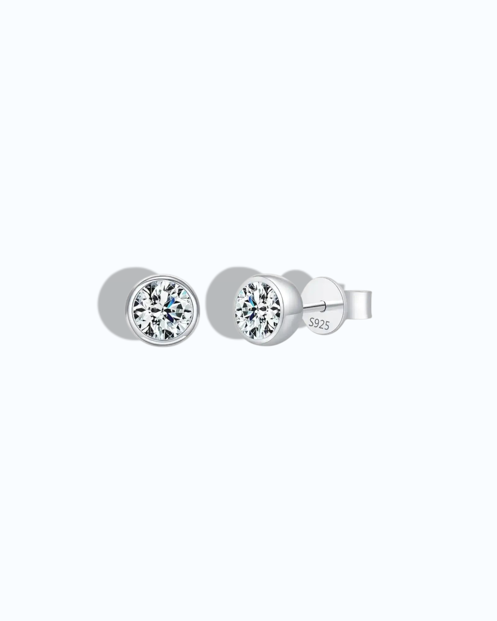 1Ct Round Bubble moissanite studs in sterling silver with rhodium finish, featuring a modern bezel setting.