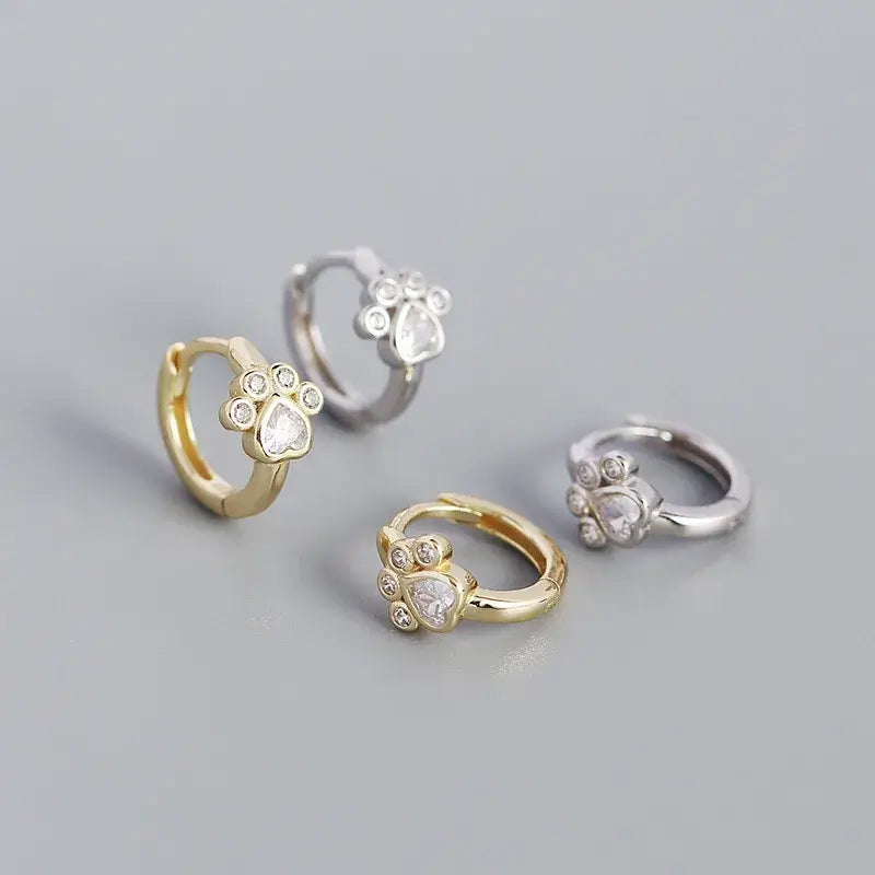 Cat Footprint Hoops in white and yellow gold, featuring delicate cat paw designs, perfect for everyday elegance.