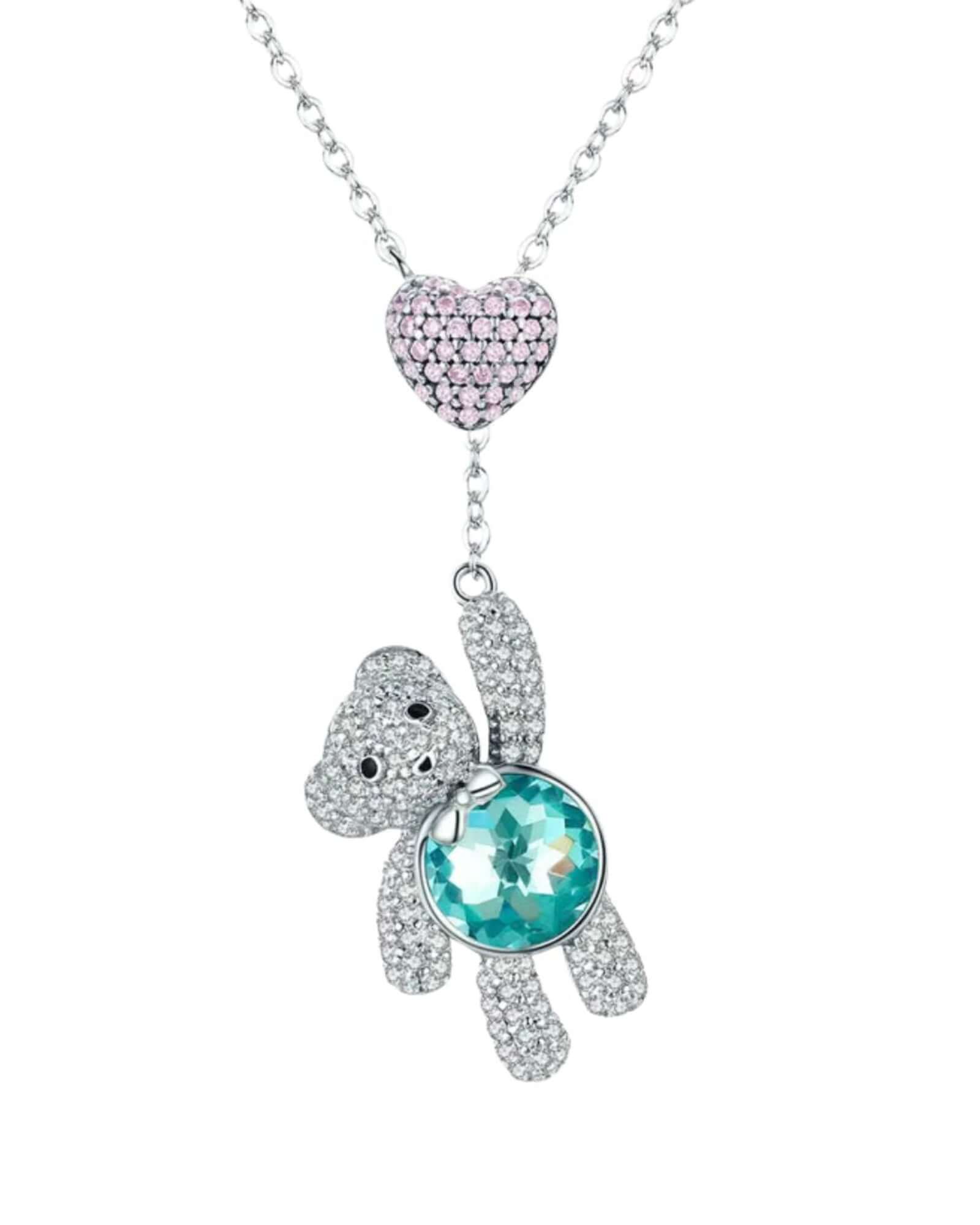 Charming pink CZ pavé heart and silver bear pendant necklace with aqua-green stone.
