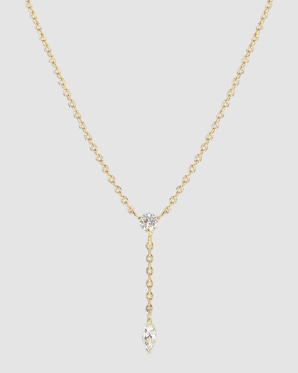 Radiant Lariat necklace with adjustable cable chain and brilliant cut zirconia, showcasing versatile elegance.