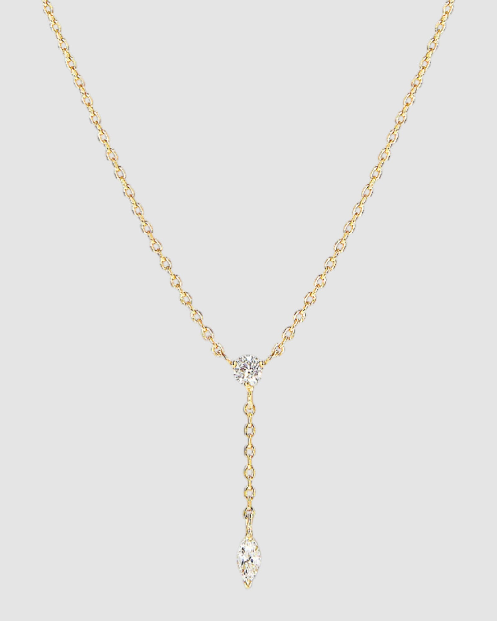 Radiant Lariat necklace with adjustable cable chain and brilliant cut zirconia, showcasing versatile elegance.