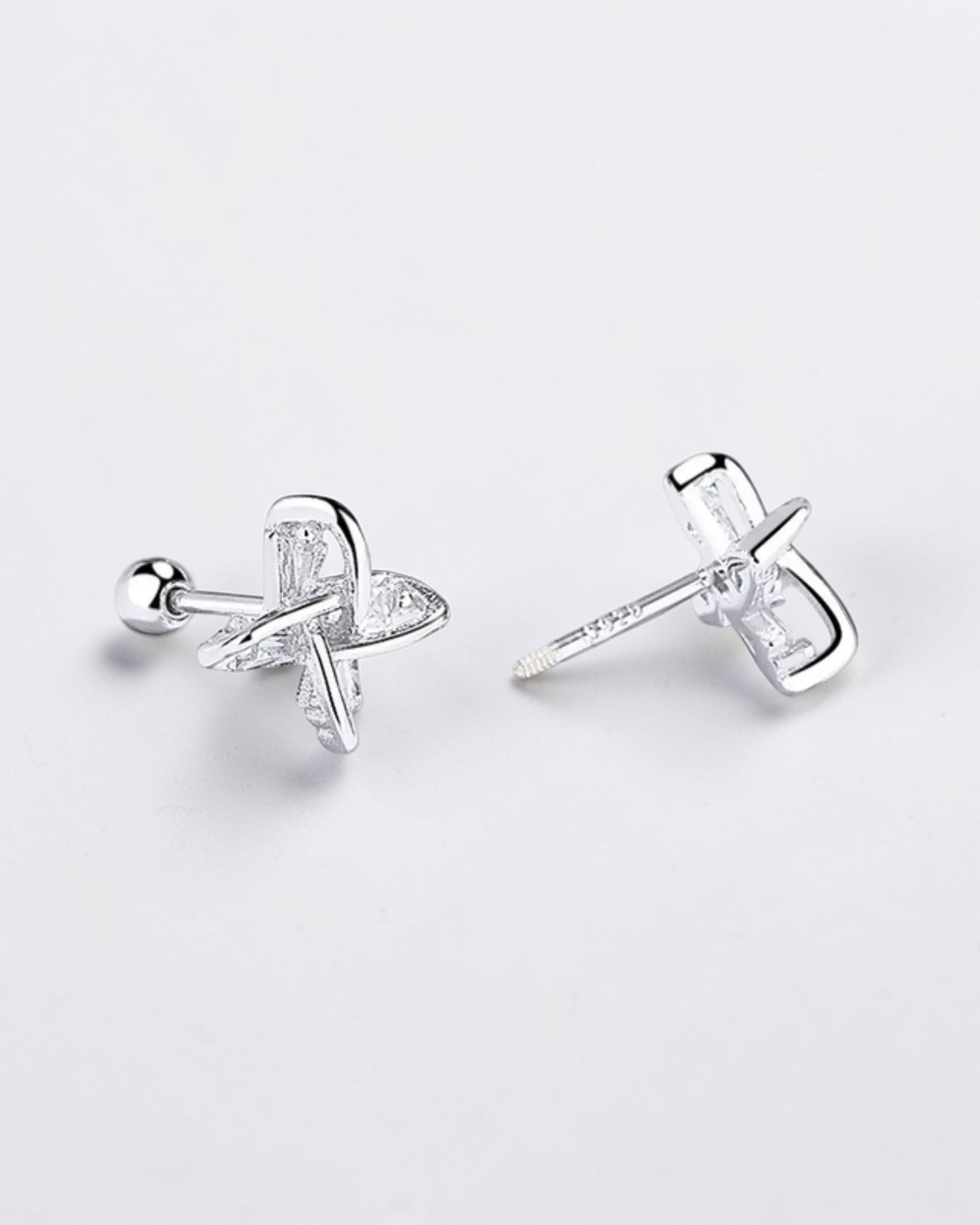 Elegant windmill ear studs in 925 sterling silver, showcasing a unique design and modern style.