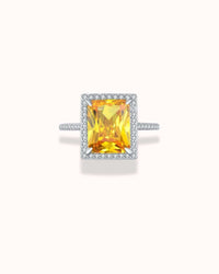 Yellow zirconia cocktail ring in sterling silver with brilliant yellow gemstone for elegant occasions.